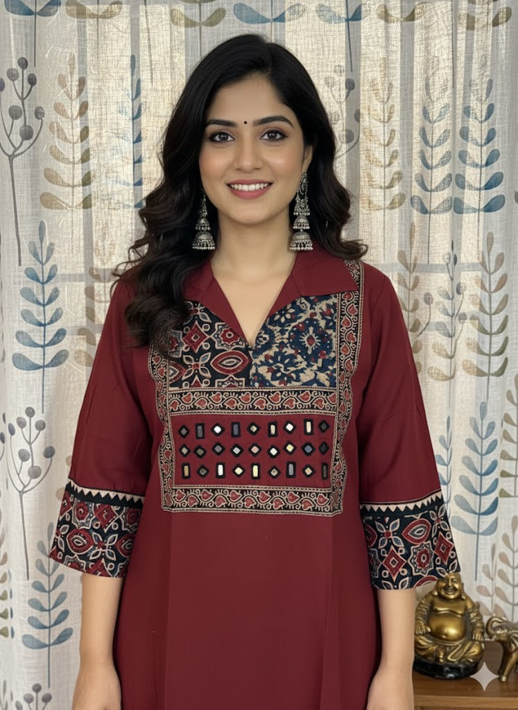 Elegant Cotton Collared Kurthi with Beautiful Ajarak Prints & Mirror Work in Yoke.