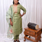 Elegant 3-Piece Set in Green Background with Thread Work in Yoke and Printed Flower Design in Silk Dupatta