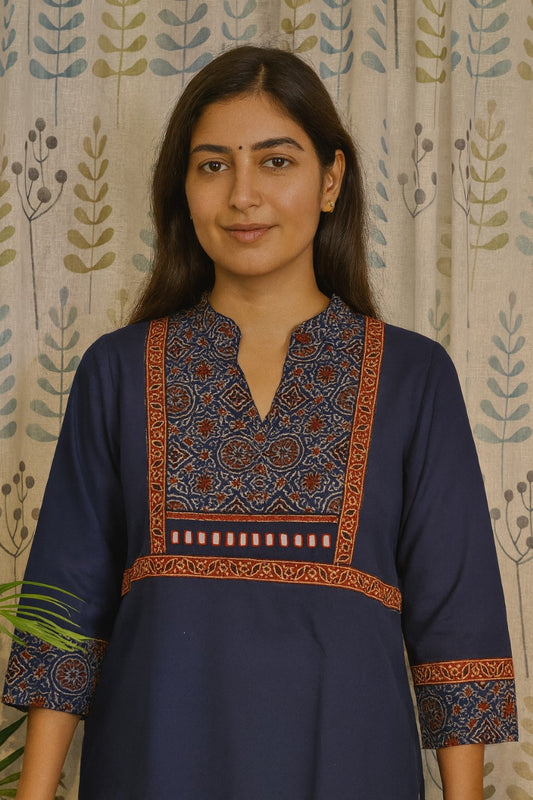 Blue straight cut kurti with handcrafted mirror accents and collar neck