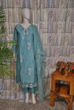 Front view of blue silk cotton kurti set with embroidery on neck and sleeves, paired with organza embroidered dupatta and matching pants.