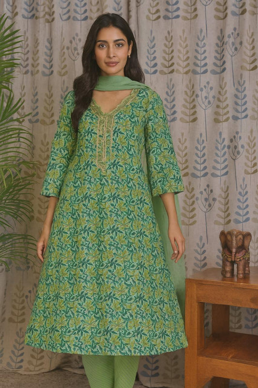 Front view of green cotton Anarkali kurti set with zari V-neck and printed design
