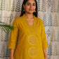 Mustard linen cotton co-ord set featuring A-line V-neck top with embroidery and palazzo pant