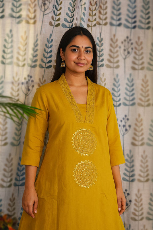 Mustard linen cotton co-ord set featuring A-line V-neck top with embroidery and palazzo pant