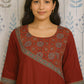 Maroon straight cut cotton kurti featuring ajarakh print on yoke and sleeves
