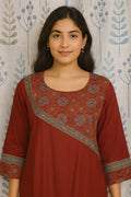 Maroon straight cut cotton kurti featuring ajarakh print on yoke and sleeves