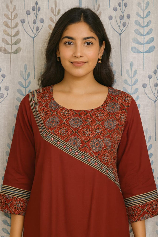 Maroon straight cut cotton kurti featuring ajarakh print on yoke and sleeves