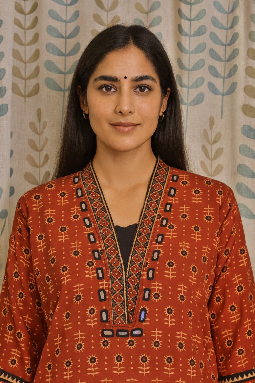 Maroon cotton kurti with V-neck mirror work and traditional ajarakh print