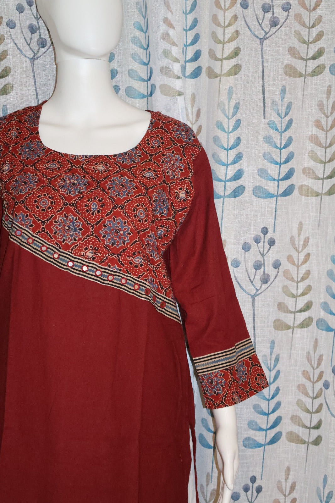 Comfortable maroon kurti ideal for casual outings and daily ethnic wear