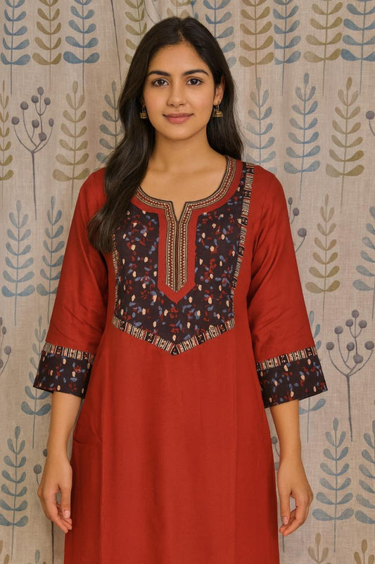 Maroon cotton kurti with ajarakh print accents on yoke and sleeves