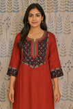 Maroon cotton kurti with ajarakh print accents on yoke and sleeves