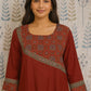 Women's maroon cotton kurti styled with traditional ajarakh motifs