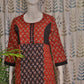 Elegant maroon cotton kurti for women with round neck and handcrafted finish