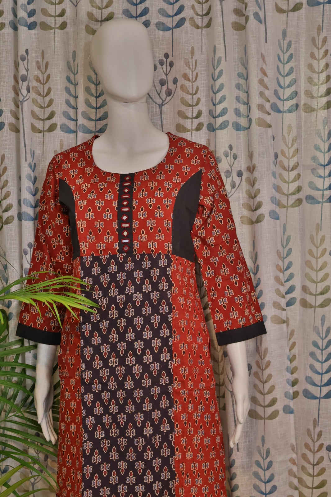Elegant maroon cotton kurti for women with round neck and handcrafted finish