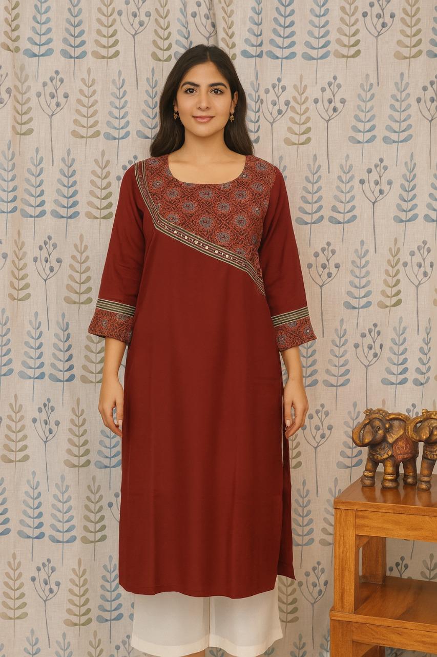 Elegant maroon cotton kurti with 3/4 sleeves and round neck design