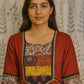 Flared maroon cotton kurti with round neck and artisan print