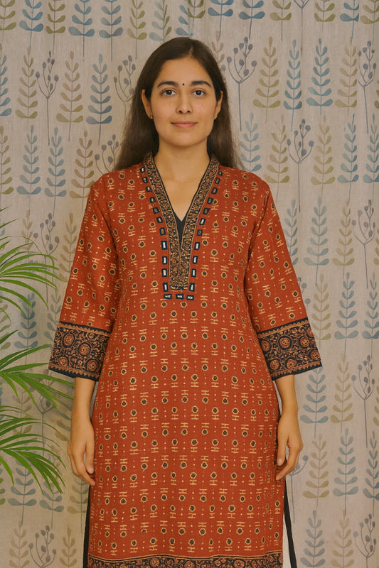 Stylish maroon kurti with handcrafted mirror work for festive and office wear