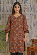 Front view of red cotton kurti with Kalamkari print and V-neck