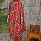 Front view of red cotton kurti set with digital floral print and matching pants