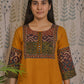Yellow cotton kurti featuring adjustable tassels for hip fitting and comfort